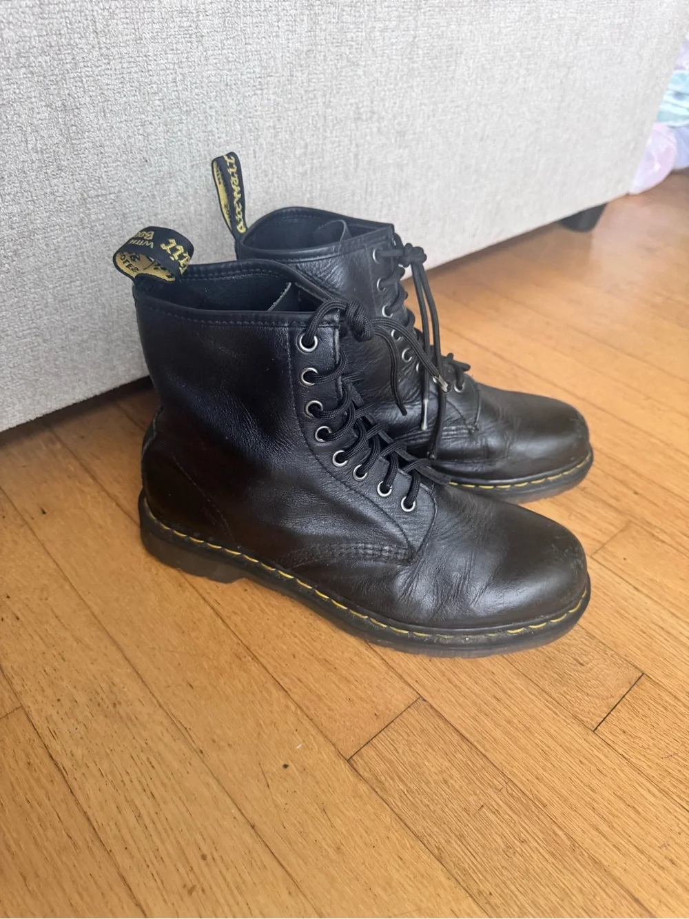 Dr. Martens Black Leather 8-Eye Lace-Up Ankle Boots with Yellow Stitching